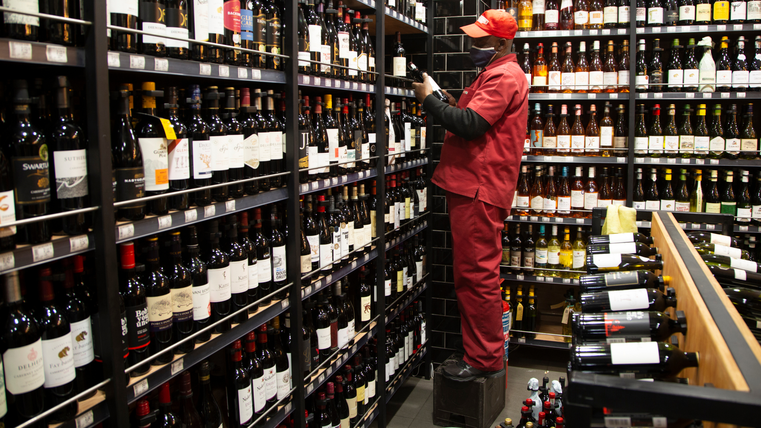 As virus cases fall, South Africa allows liquor sales