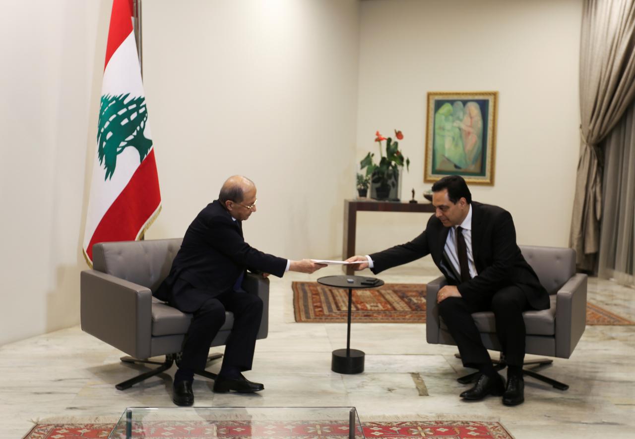 Lebanon's Prime Minister Hassan Diab submits his resignation to Lebanon's President Michel Aoun at the presidential palace in Baabda, Lebanon August 10, 2020. REUTERS/Aziz Taher