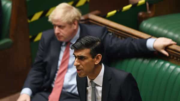 UK bolsters economic support as England goes into lockdown