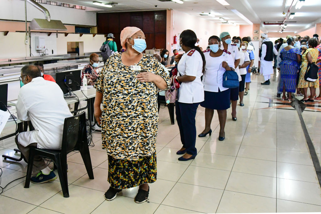 Rich, developing nations wrangle over COVID vaccine patents