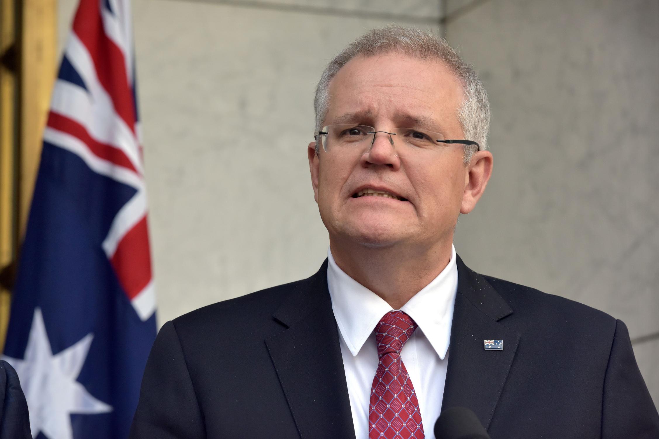 Australia PM says pandemic focus must shift to reopening