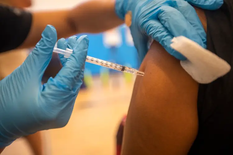 US Hits 70% Vaccination Rate Amid Virus Surge