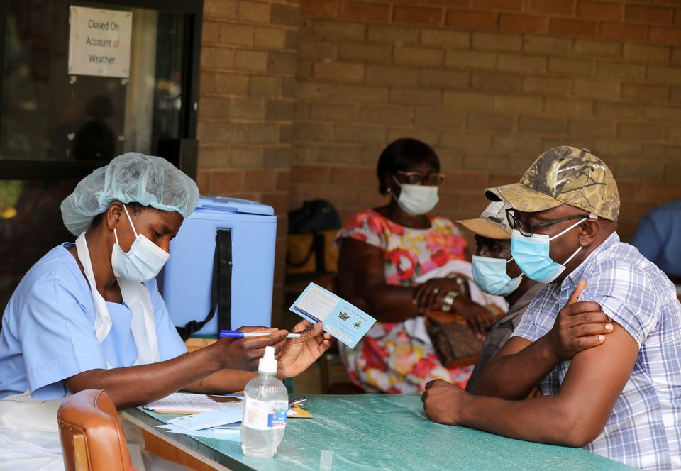 Zimbabwe bars unvaccinated civil servants from work