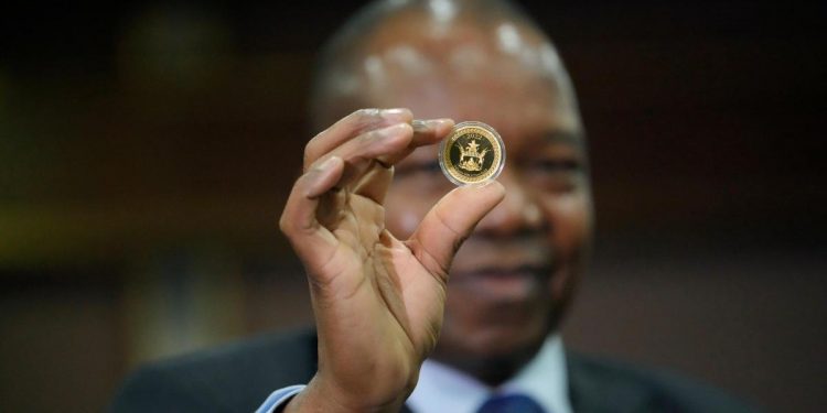 Zimbabwe debuts gold coins as legal tender to stem inflation