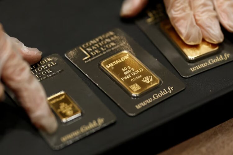 Gold tumbles to two month low as Iran conflict lifts dollar and oil