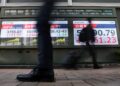 World stocks hit record highs as oil heads for sharp weekly fall