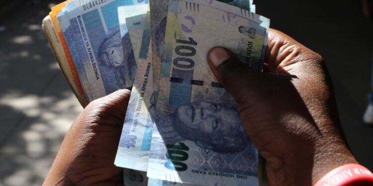 South African rand slips as markets weigh anti immigration demonstrations